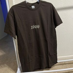 1999 Tee